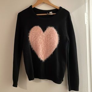 Black sweater with pink fluffy heart design